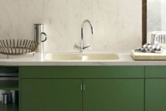 Corian® Solid Surface Residential Sink in Vanilla Paired With a Countertop and Backsplash In Corian® Clam Shell
