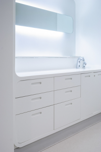 Solid surface hospital cabinets in Glacier White Corian®