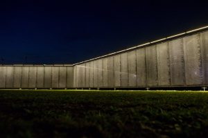 Night view with lights of The Wall That Heals by Creatacor