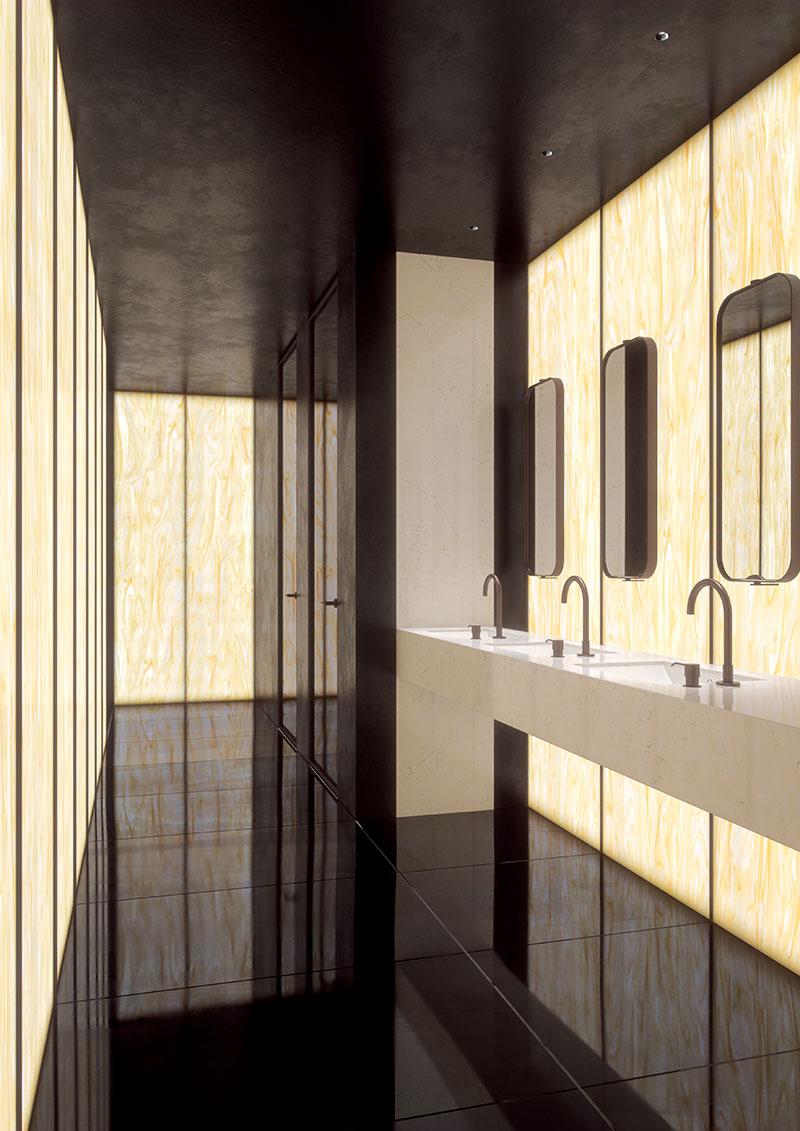 Backlit walls of solid surface in Corian Golden Onyx, hospitality setting