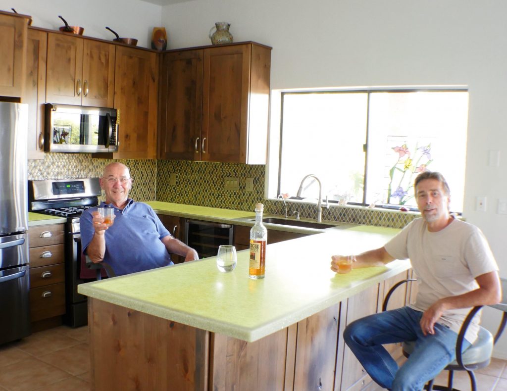 Jerry Michaels and Jim Glinski enjoying their DIY backlit countertop project in Cat Eye from STUDIO Collection®
